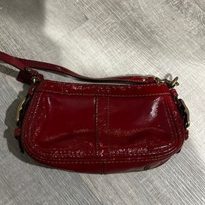 Coach shiny red wristlet purse